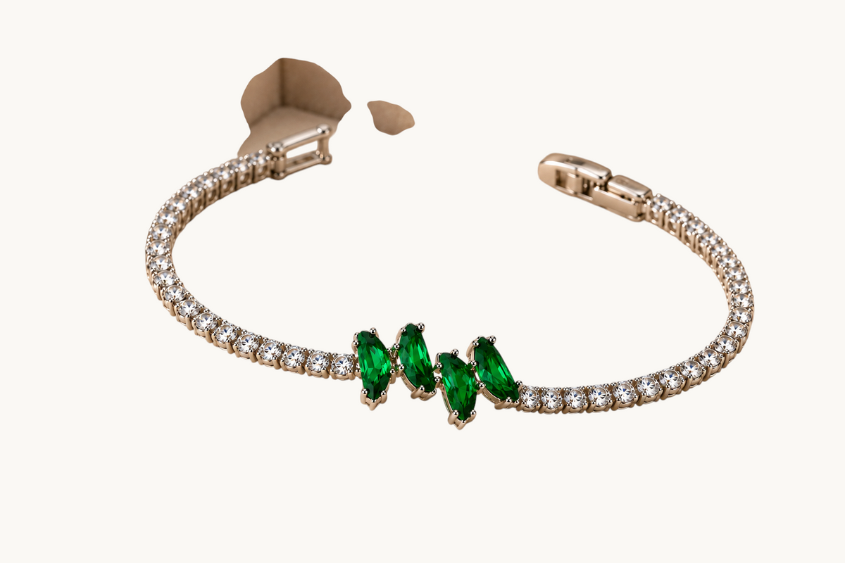 TITLIYA silver-tone link bracelet featuring marquise-cut green crystals and clear stone accents in a floral design.