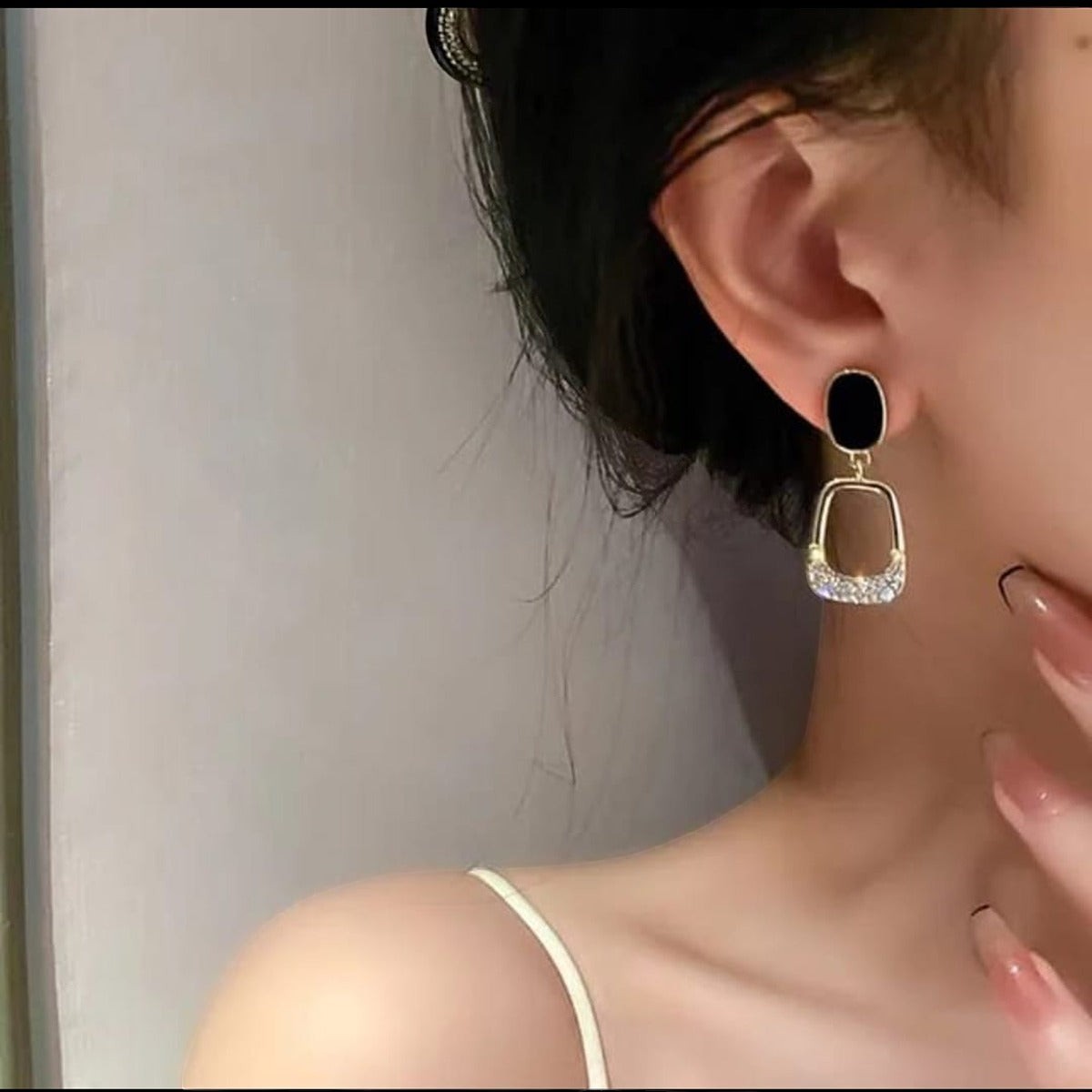 TITLIYA black and gold Korean drop earrings featuring a geometric design with sparkling crystals for elegant wear.