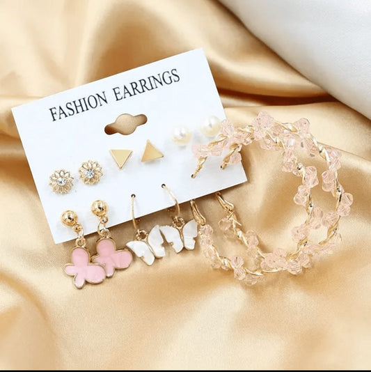 TITLIYA set of 6 Korean earrings featuring butterfly, pearl, and crystal hoop designs on a gold satin background.