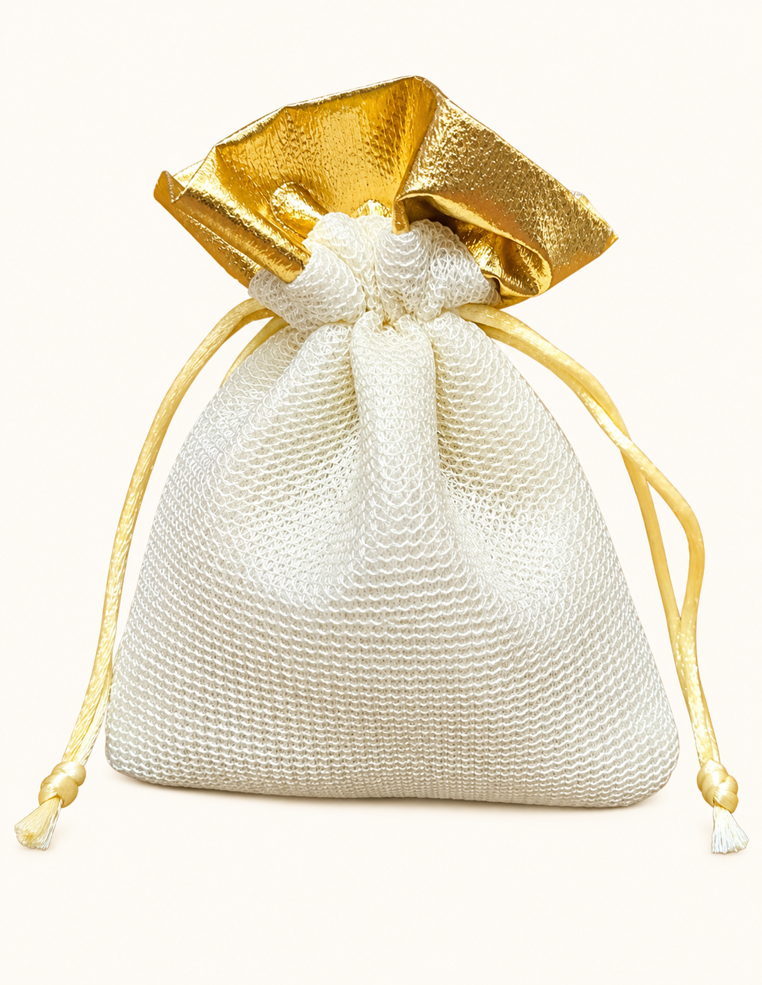 Golden decorative potli bag included in the TITLIYA Golden Moments jewellery gift box
