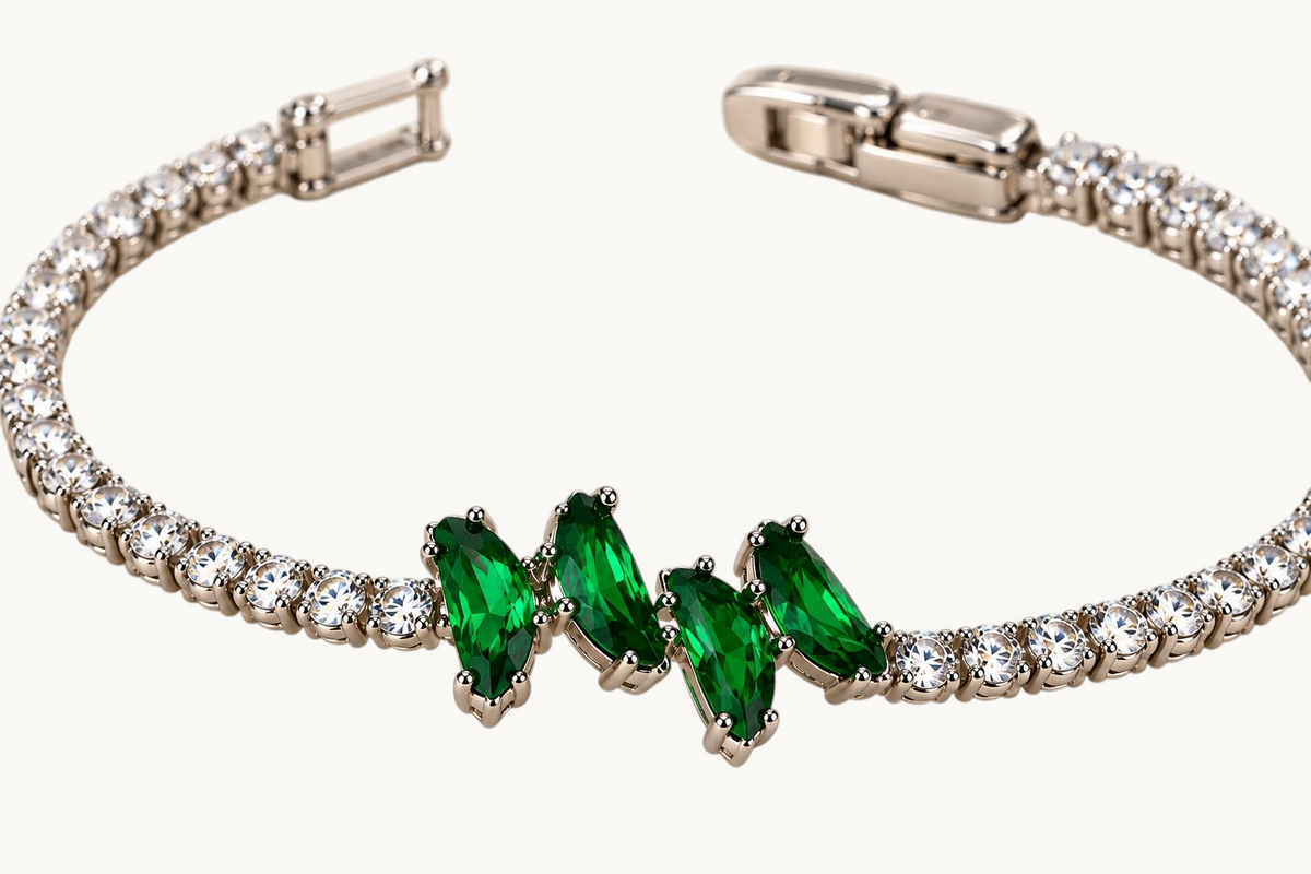 TITLIYA silver-tone link bracelet featuring marquise-cut green crystals and clear stone accents in a floral design.