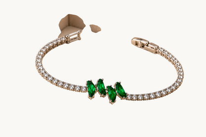 TITLIYA silver-tone link bracelet featuring marquise-cut green crystals and clear stone accents in a floral design.