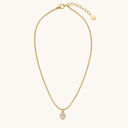 TITLIYA gold-tone fine chain necklace featuring a delicate mini heart pendant with a sparkling clear stone center.