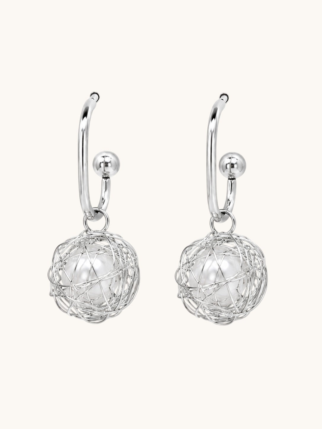 Elegant silver hoop earrings with pearls