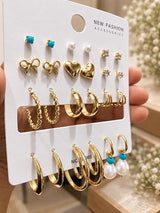 Assorted earrings from the TITLIYA Golden Moments gift box for women