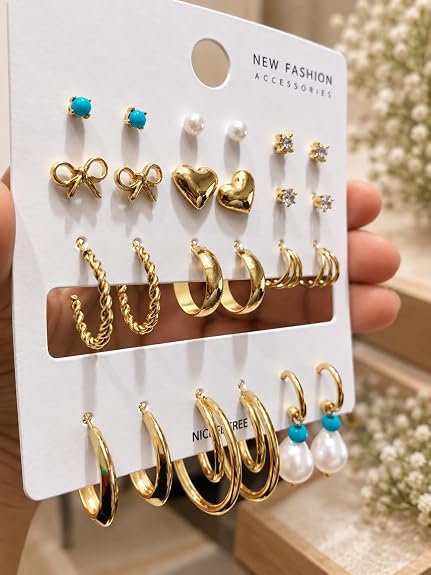 Assorted earrings from the TITLIYA Golden Moments gift box for women