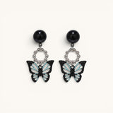 TITLIYA Korean style acrylic butterfly earrings in black and light blue with silver beaded circular accents.