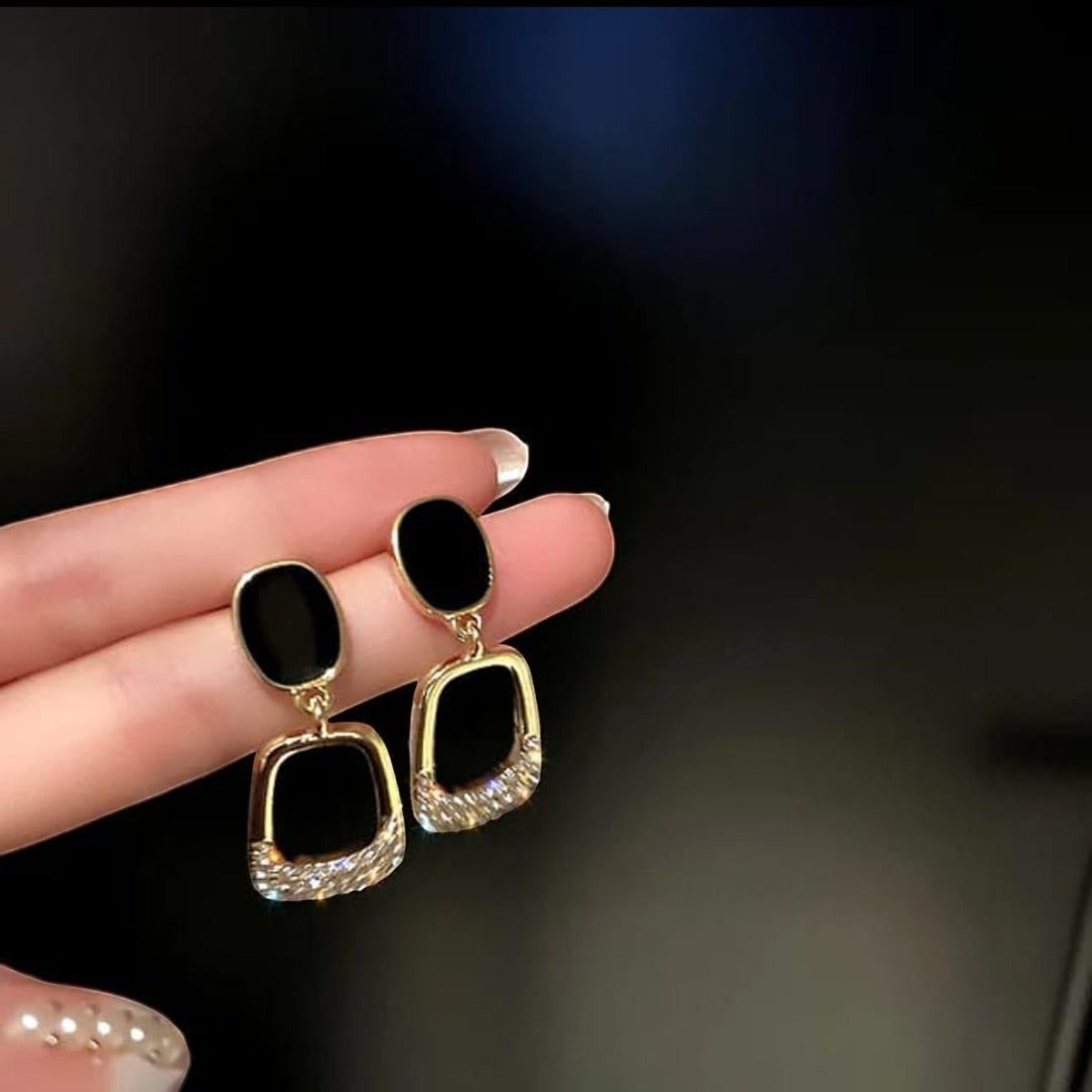 TITLIYA black and gold Korean drop earrings featuring a geometric design with sparkling crystal accents.