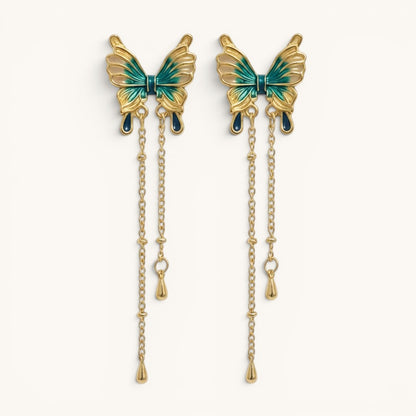 TITLIYA gold-tone butterfly drop earrings with ocean blue enamel detailing and delicate hanging chain accents.