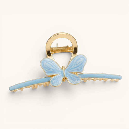 TITLIYA luxury sky-blue enamel butterfly hair claw clip with a gold-tone metal base for a secure grip.
