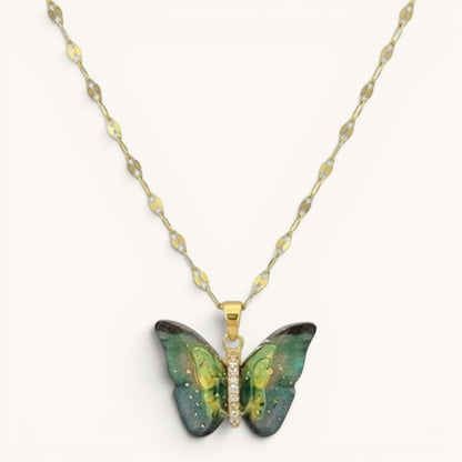 TITLIYA vibrant blue and green butterfly pendant necklace with a gold chain and crystal-accented center.