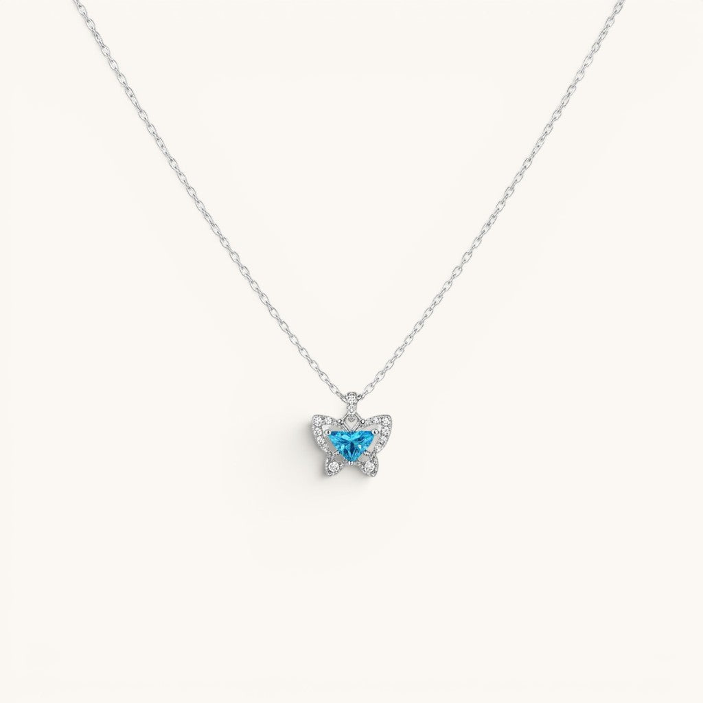 TITLIYA blue butterfly pendant necklace with a sparkling crystal center and delicate silver chain.