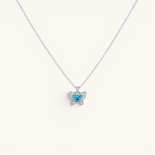 TITLIYA blue butterfly pendant necklace with a sparkling crystal center and delicate silver chain.