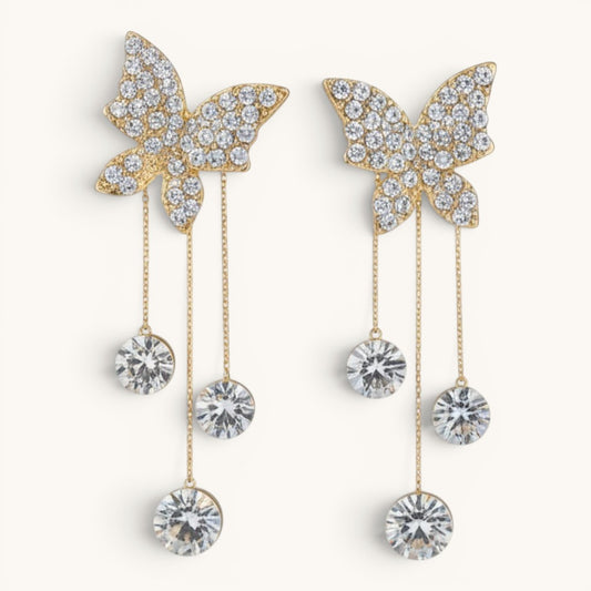 TITLIYA gold-tone Korean style butterfly dangle earrings with sparkling crystal accents and delicate chain drops.
