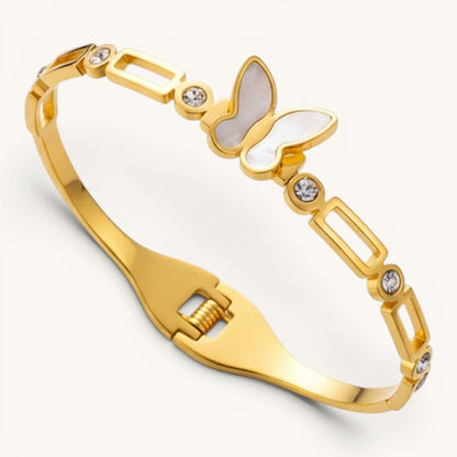 TITLIYA gold-plated bracelet with a pearlescent butterfly motif and crystal accents on a chain-link band.