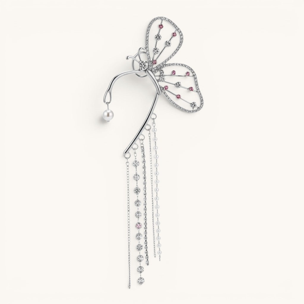 TITLIYA butterfly long cuff earring in silver with pink crystals, pearl accents, and dangling chain tassels.
