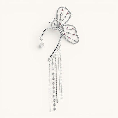 TITLIYA butterfly long cuff earring in silver with pink crystals, pearl accents, and dangling chain tassels.