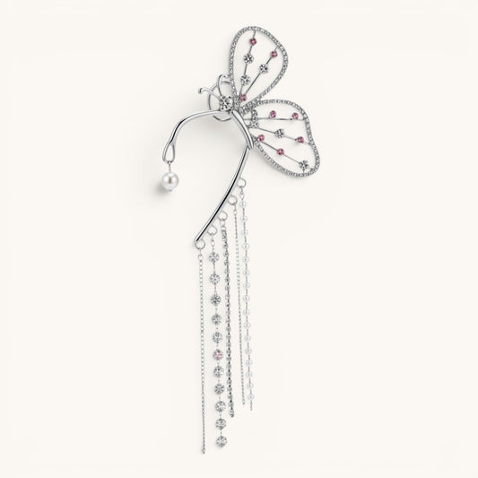 TITLIYA butterfly long cuff earring in silver with pink crystals, pearl accents, and dangling chain tassels.