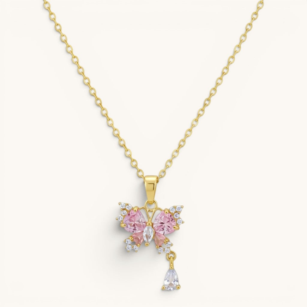TITLIYA gold-tone butterfly pendant necklace with pink and clear crystals and a dangling teardrop charm.