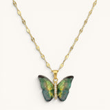 TITLIYA Luna-style gold alloy necklace featuring a green and black butterfly pendant with crystal accents.