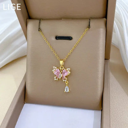 TITLIYA gold-tone butterfly pendant necklace with pink and clear crystals and a dangling teardrop charm in a gift box