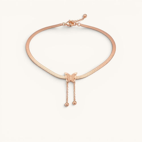 TITLIYA rose gold-toned snake chain necklace featuring a textured butterfly pendant with two dainty drop bead chains.