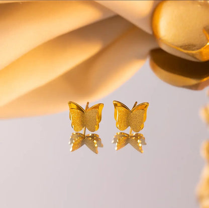 TITLIYA gold-toned butterfly stud earrings with textured wings, perfect for elegant daily wear.