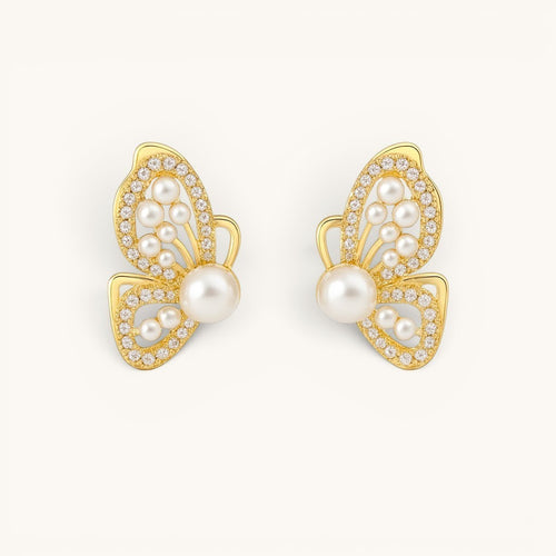 TITLIYA gold butterfly wing stud earrings featuring white pearls and sparkling crystals in a premium Korean style.