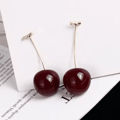 TITLIYA trending cherry earrings with glossy dark red fruit charms and gold-tone stems for a stylish daily look.