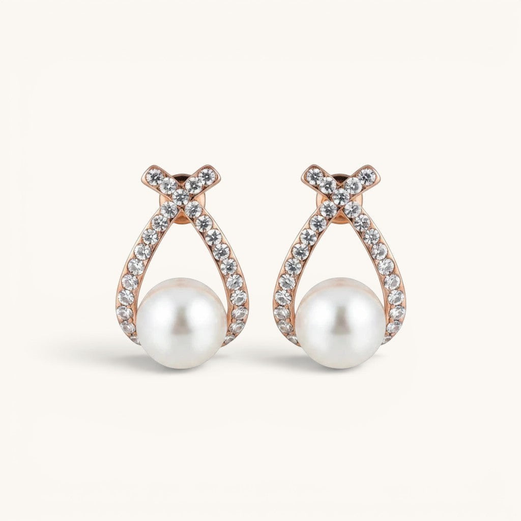 TITLIYA rose gold double cross earrings featuring sparkling crystals and a central white pearl for elegant daily wear.