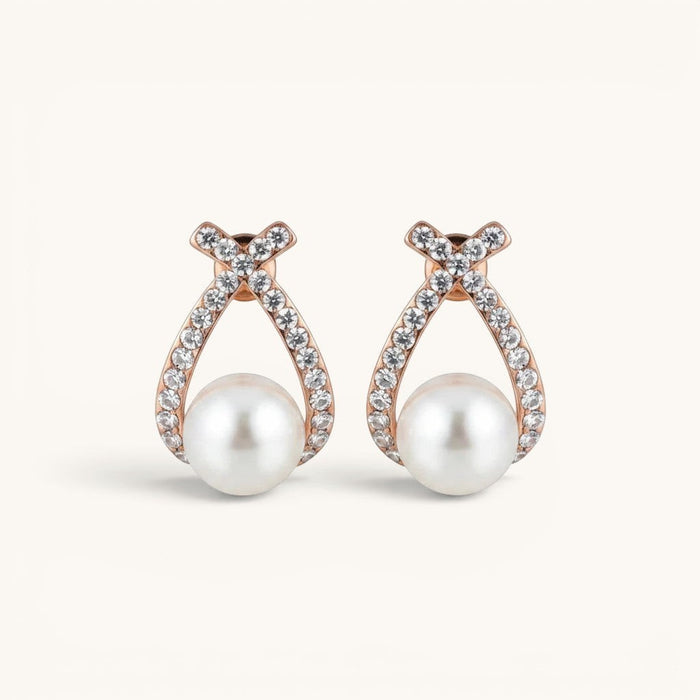 TITLIYA rose gold double cross earrings featuring sparkling crystals and a central white pearl for elegant daily wear.