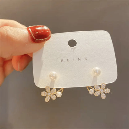 TITLIYA Korean-style flower earrings with sparkling crystals and white pearls, perfect for elegant daily wear.