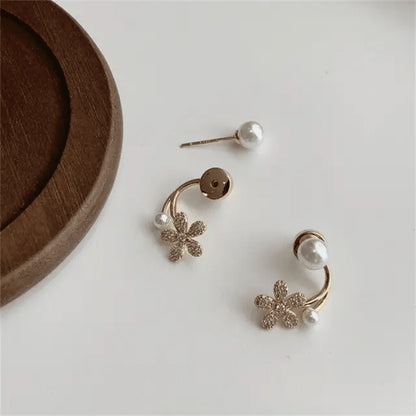 TITLIYA gold-tone flower earrings with pearl accents and sparkling crystals for an elegant Korean-style look.