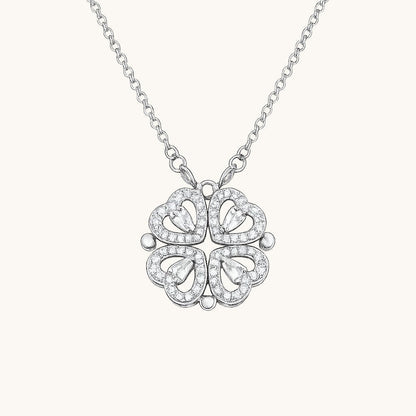 TITLIYA silver magnetic pendant necklace featuring four heart-shaped clover leaves with sparkling crystal accents.