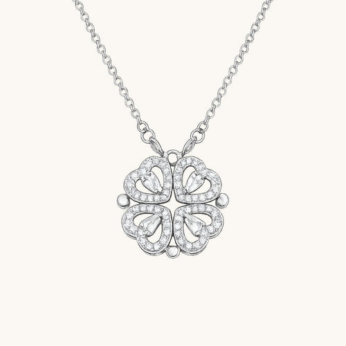 TITLIYA silver magnetic pendant necklace featuring four heart-shaped clover leaves with sparkling crystal accents.