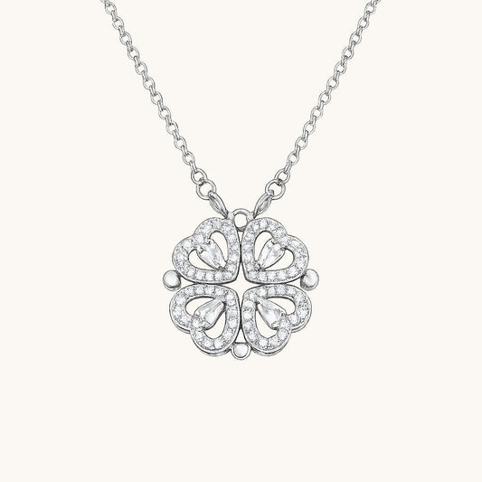 TITLIYA silver magnetic pendant necklace featuring four heart-shaped clover leaves with sparkling crystal accents.