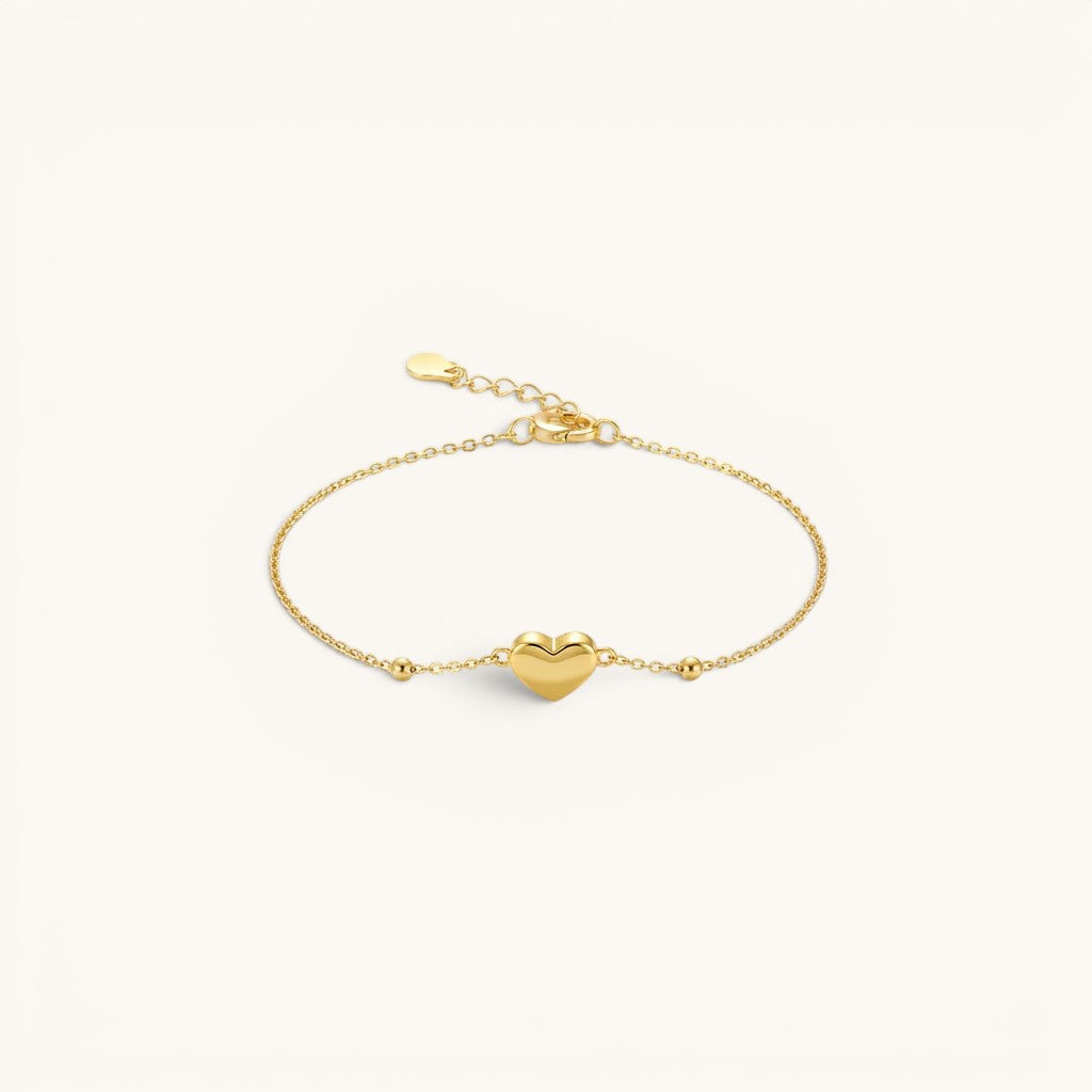 TITLIYA delicate gold heart charm bracelet with dainty bead accents on a fine adjustable chain.