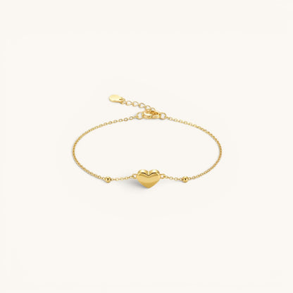TITLIYA delicate gold heart charm bracelet with dainty bead accents on a fine adjustable chain.