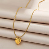 TITLIYA gold-tone heart pendant necklace with a sleek snake chain, perfect for daily wear or elegant gifting.