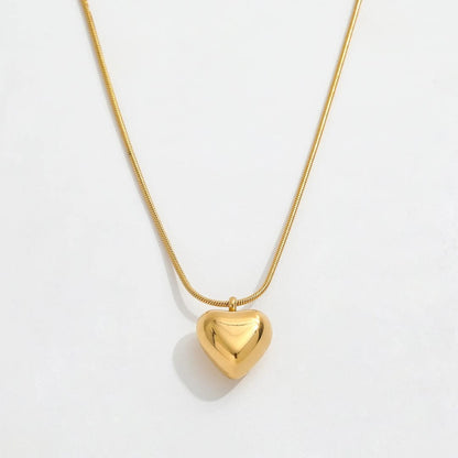 TITLIYA gold-tone heart pendant necklace with a sleek snake chain, perfect for daily wear or elegant gifting.