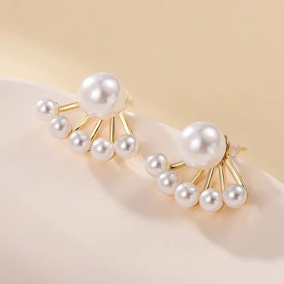 TITLIYA gold-plated needle earrings featuring a fan-shaped design with multiple white pearls for elegant daily wear.