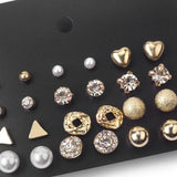 TITLIYA set of 12 gold-tone stud earrings featuring pearls, crystals, hearts, and geometric shapes for daily wear.