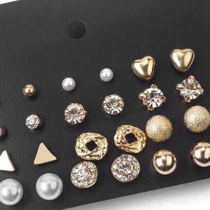TITLIYA set of 12 gold-tone stud earrings featuring pearls, crystals, hearts, and geometric shapes for daily wear.