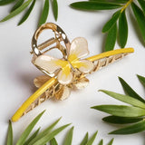 TITLIYA gold-tone butterfly hair claw clip with yellow enamel wings, perfect for a secure and stylish hairstyle.