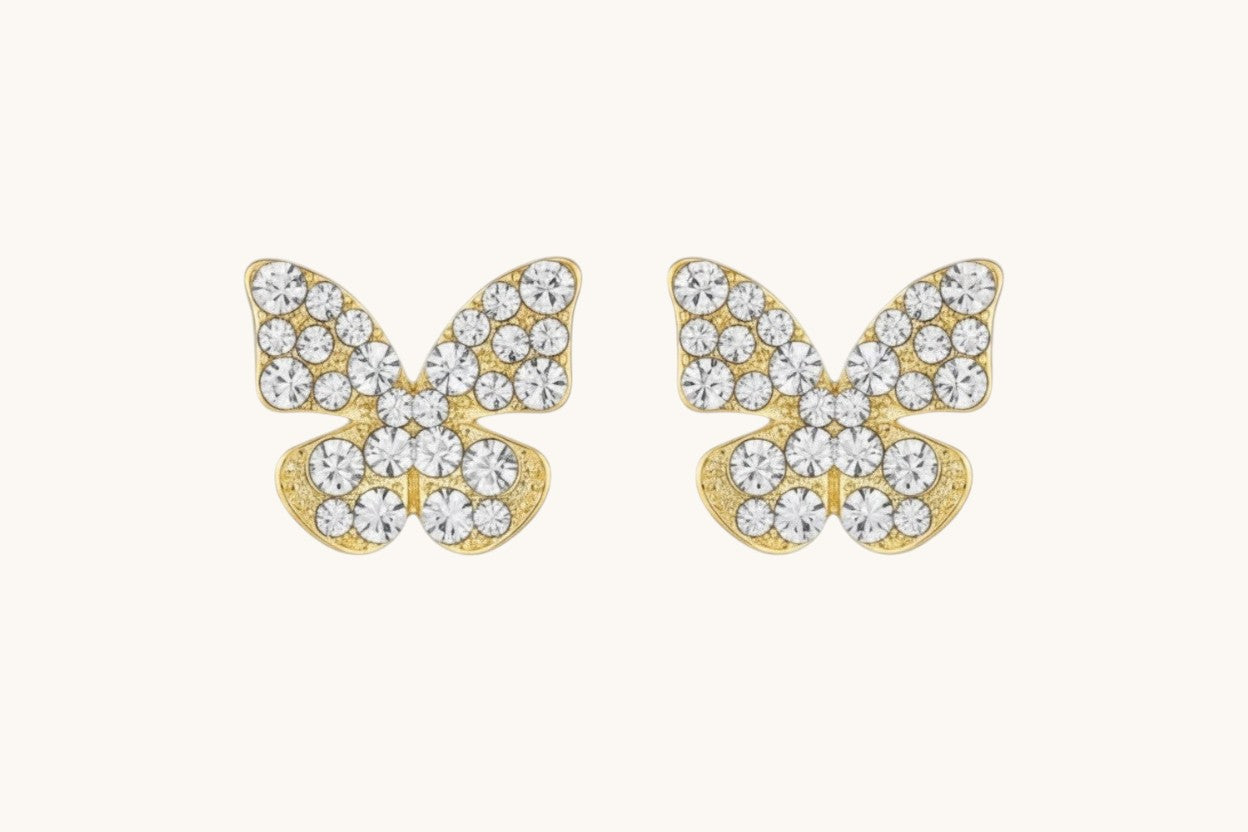 TITLIYA golden butterfly stud earrings featuring a textured finish and sparkling diamond dust accents.