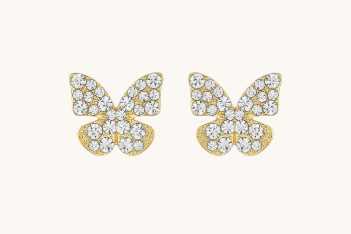 TITLIYA golden butterfly stud earrings featuring a textured finish and sparkling diamond dust accents.