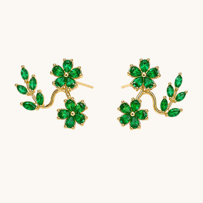 TITLIYA gold-tone Korean stud earrings featuring green crystal leaf and flower designs for elegant daily wear.