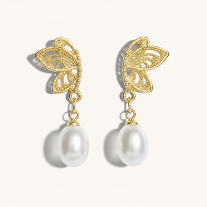 TITLIYA gold-tone half butterfly stud earrings with elegant dangling white pearls for a chic, premium look.