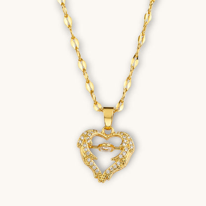 TITLIYA gold-tone heart pendant necklace with crystal accents and delicate chain for elegant daily wear.