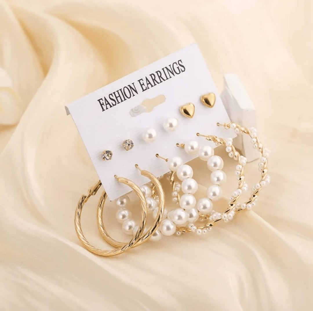 TITLIYA set of 12 gold-tone Korean earrings featuring pearl hoops, heart studs, and crystal accents for daily wear.